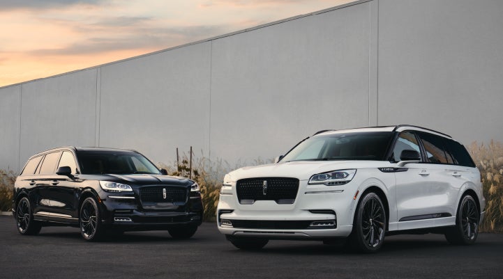 Two Lincoln Aviator® SUVs are shown with the available Jet Appearance Package | Bozard Lincoln in Saint Augustine FL