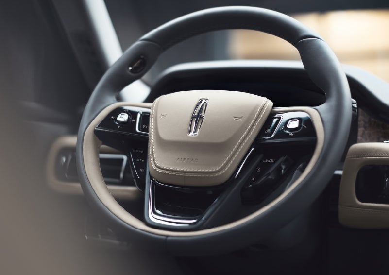 The intuitively placed controls of the steering wheel on a 2024 Lincoln Aviator® SUV | Bozard Lincoln in Saint Augustine FL